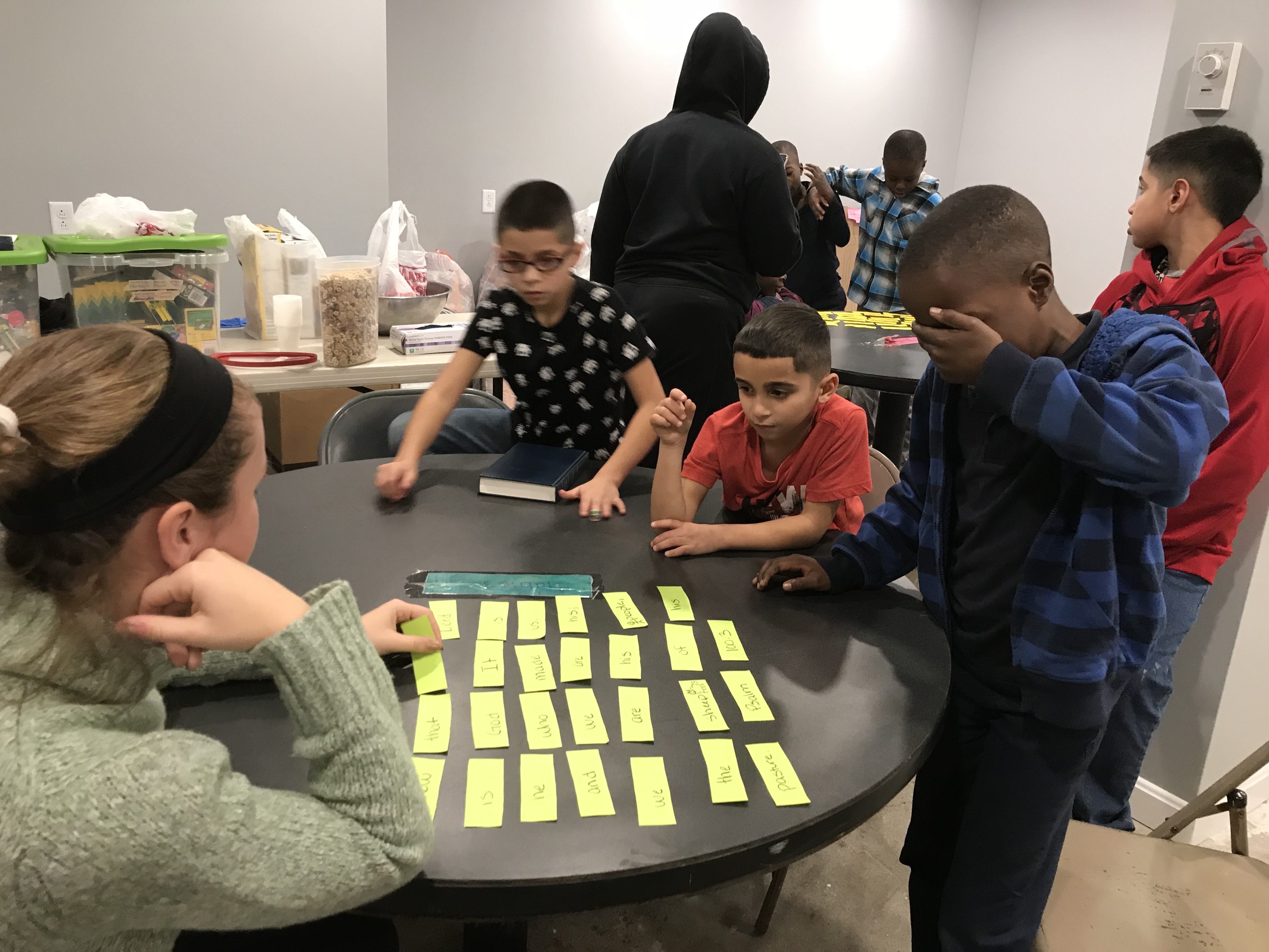 Children participating in a word card activity.
