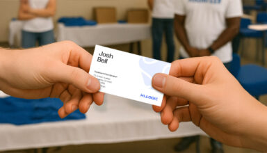 Two people exchanging business card.