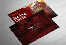 SteakHouse postcards on a wood texture.