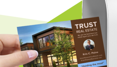 Real estate postcard entering a mailbox.